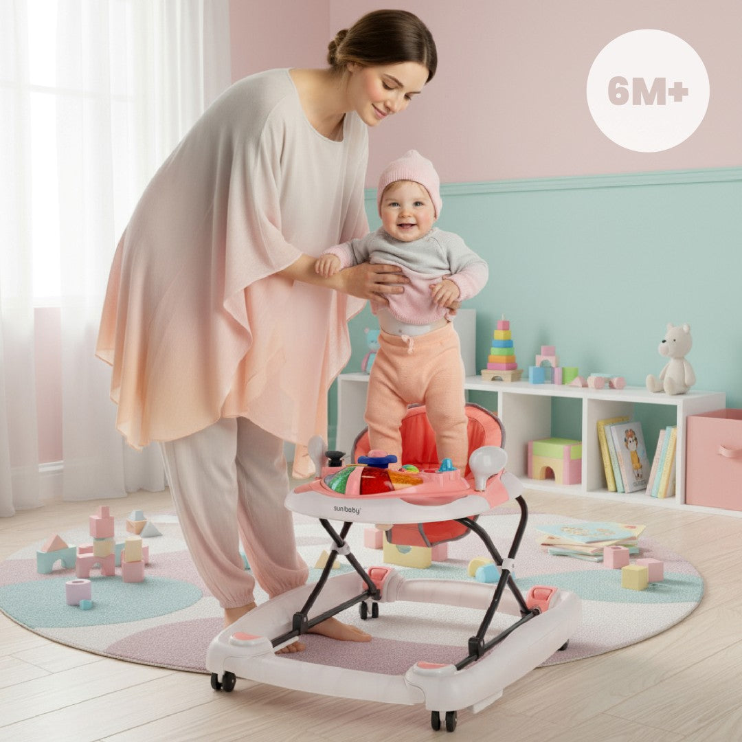 Interaktywny chodzik dla dziecka kołyska z kierownicą różowo szary