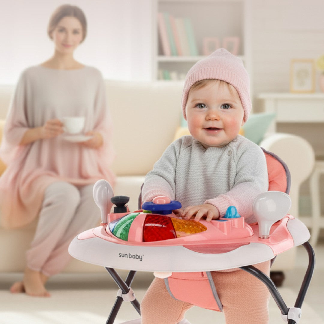 Interaktywny chodzik dla dziecka kołyska z kierownicą różowo szary