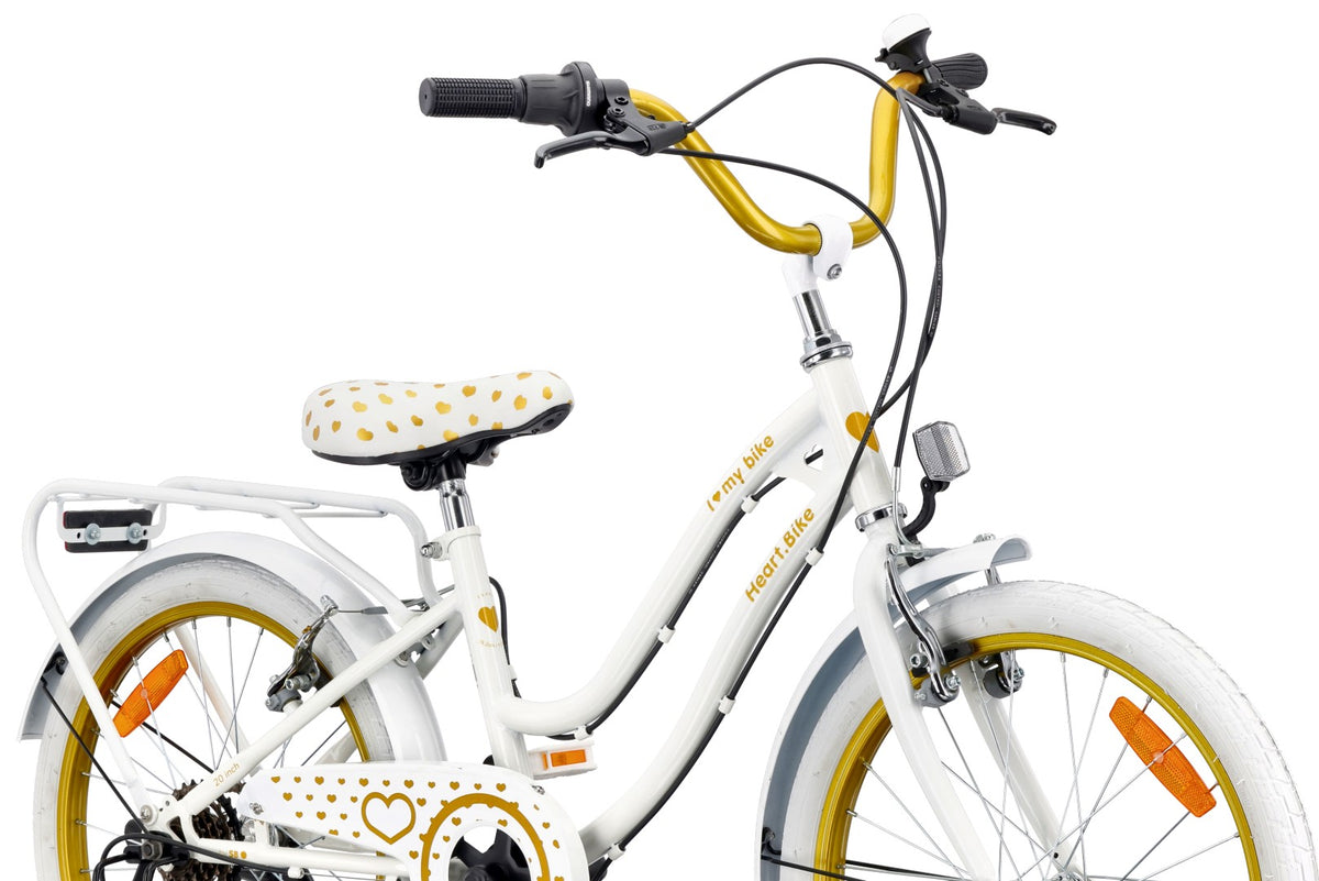 20-inch girls' bike with a 6-speed Shimano Tourney cassette and a Revoshift Heart Bike shifter, gold and white