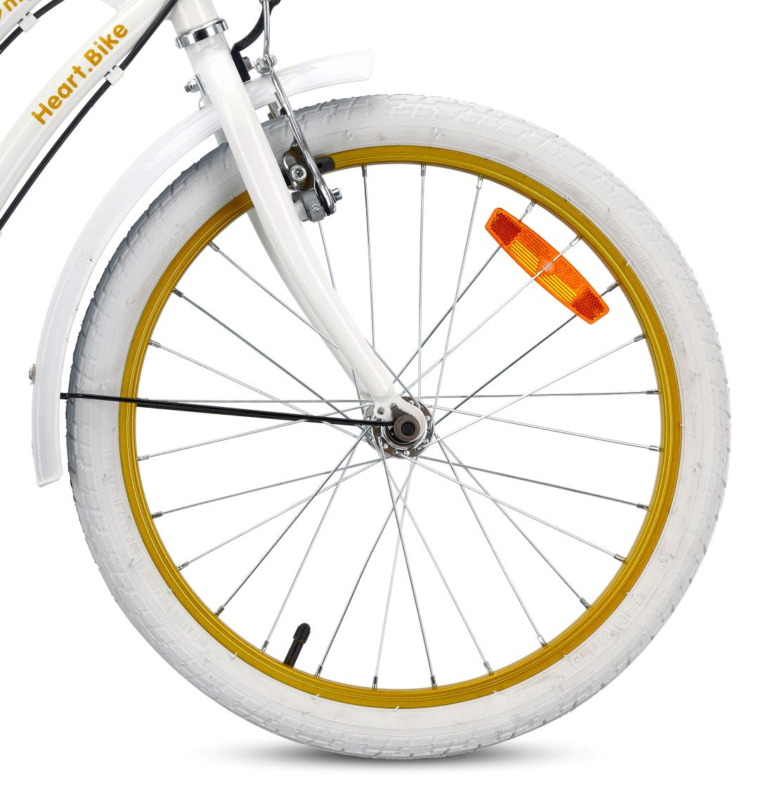 20-inch girls' bike with a 6-speed Shimano Tourney cassette and a Revoshift Heart Bike shifter, gold and white