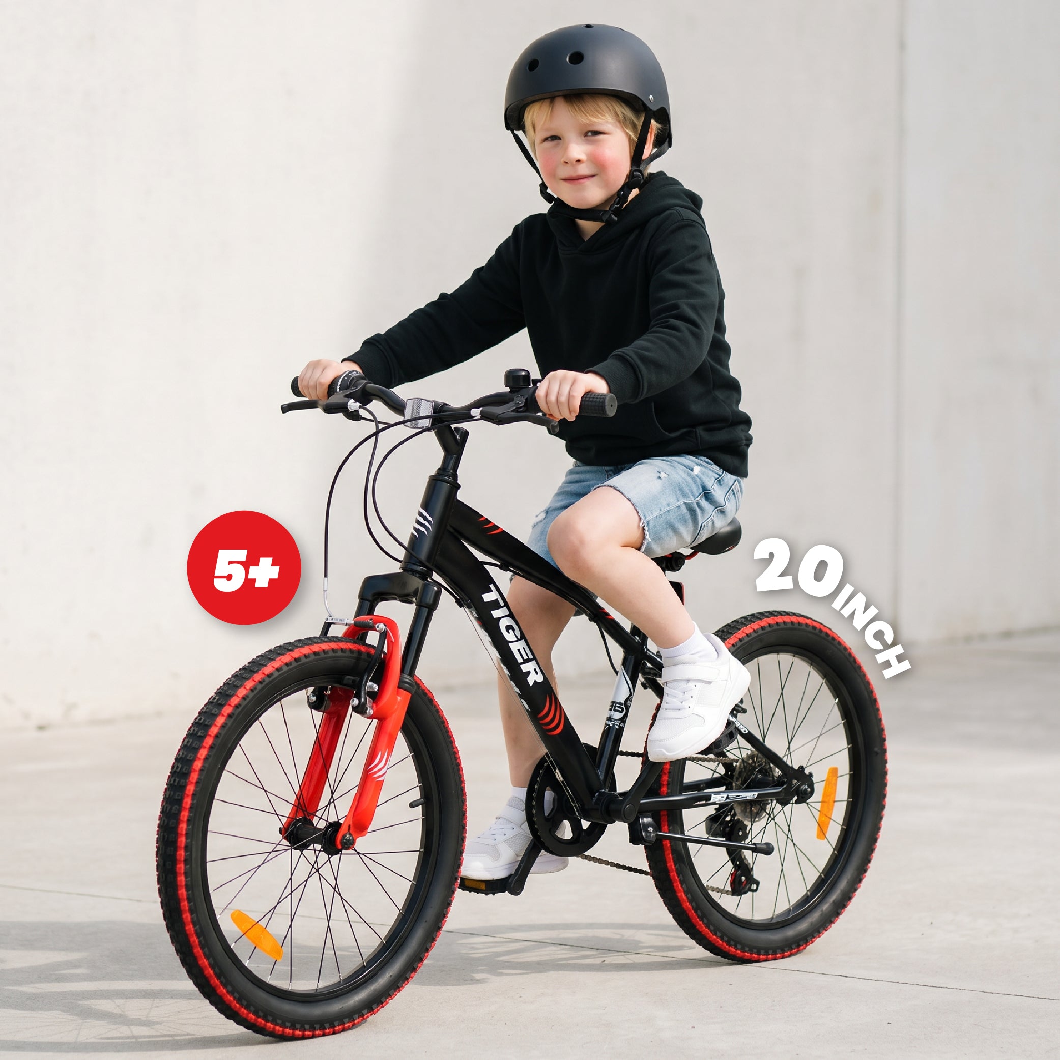 Jungenfahrrad 20 Zoll, 6-Gang-Shimano-Gang-Federung, breite Reifen, Revoshift, Tiger Bike, schwarz/rot