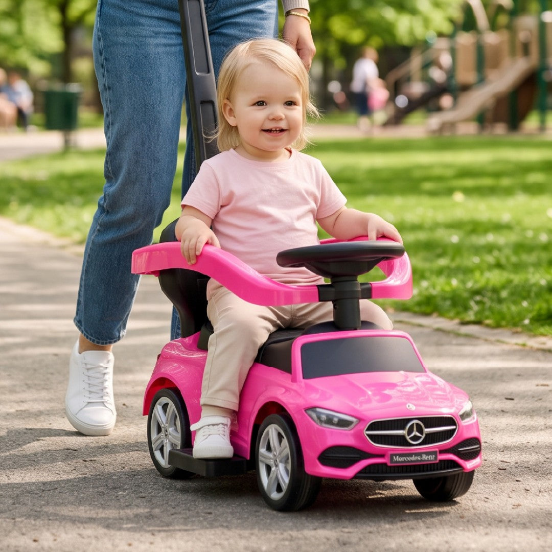 Jeździk pchacz chodzik dla dziecka Mercedes C-Class z popychaczem i podnóżkiem różowy Sun Baby