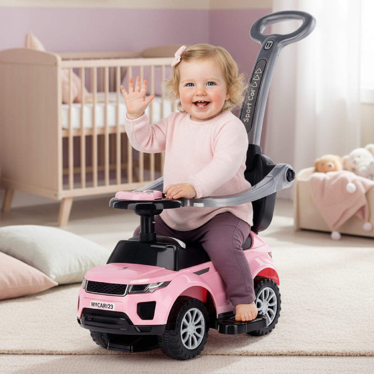 Jeździk dla dziecka z rączką i obejmą Sport car jasny różowy II gatunek