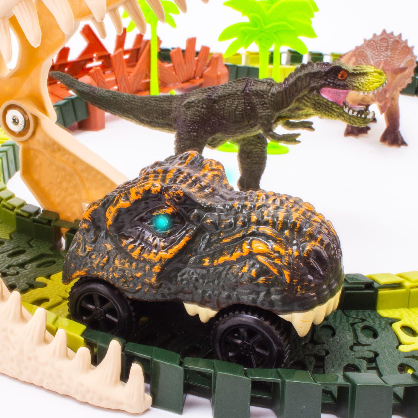 Tor wyścigowy samochodowy dla dzieci Dinozaur 86 el Dinozaury Auto Sun Baby