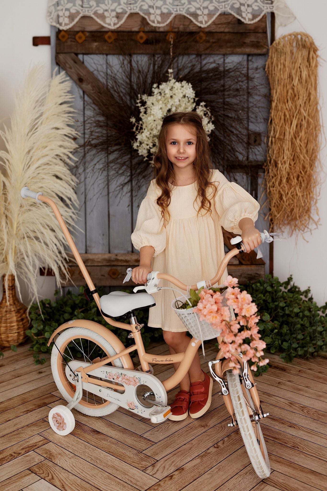 Rower dla dziewczynki 16 cali Pchacz kółka boczne Flower bike morelowy
